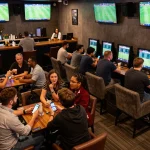 Soi Kèo sports bettors analyzing live matches and odds in an exciting lounge atmosphere